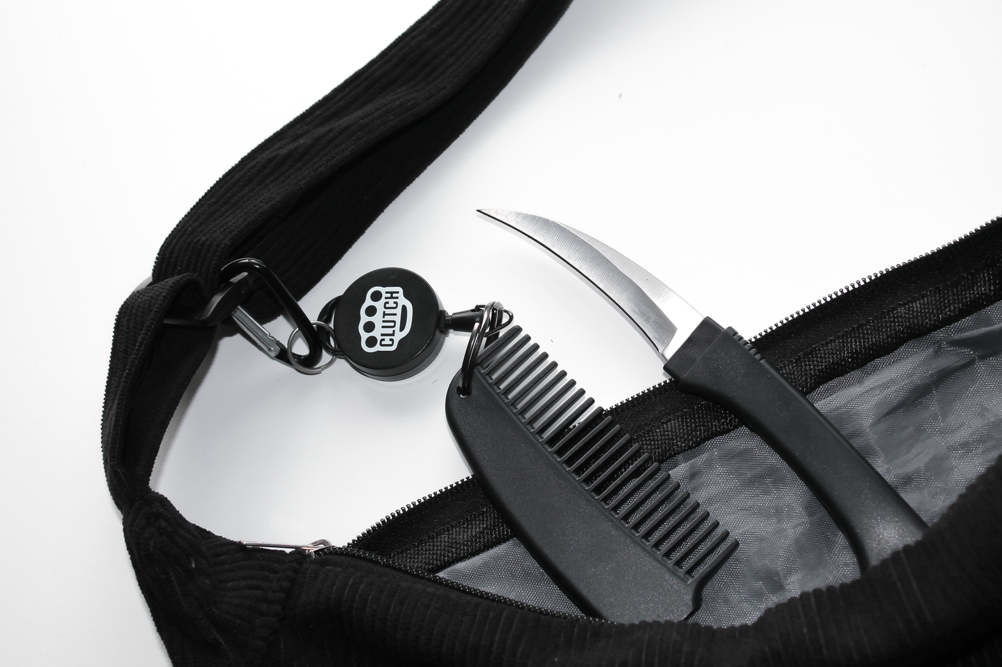 THE SHIV CLUTCH DEFENSE© DISCREET RETRACTABLE KEYCHAIN COMB KNIFE