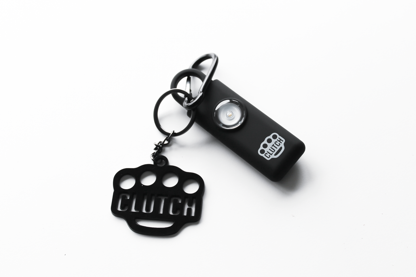 THE SNITCH CLUTCH DEFENSE© KEYCHAIN PERSONAL SAFETY ALARM. AUTOMATIC 911 CALL & EMERGENCY CONTACT GPS LOCATION.