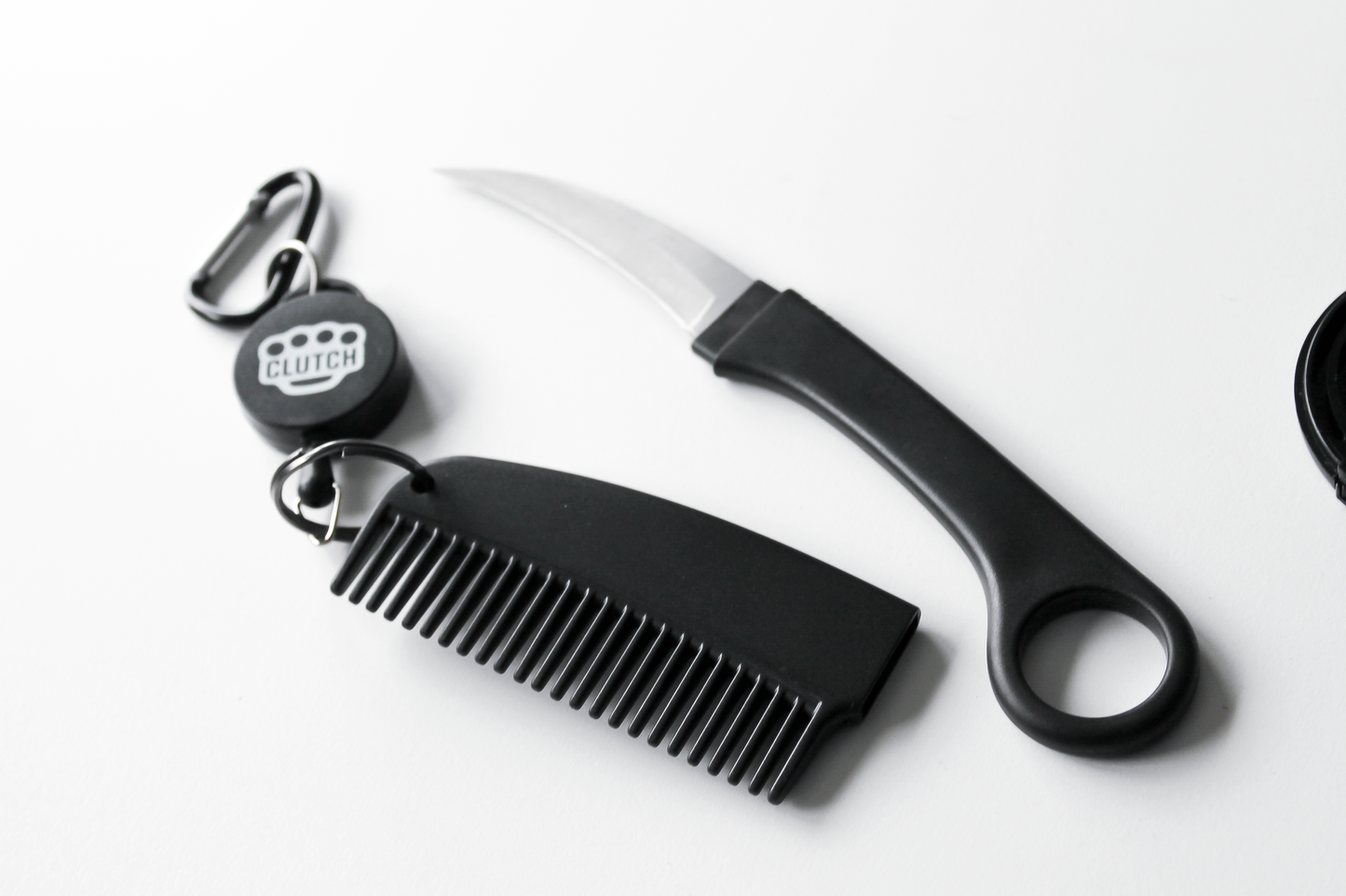 THE SHIV CLUTCH DEFENSE© DISCREET RETRACTABLE KEYCHAIN COMB KNIFE
