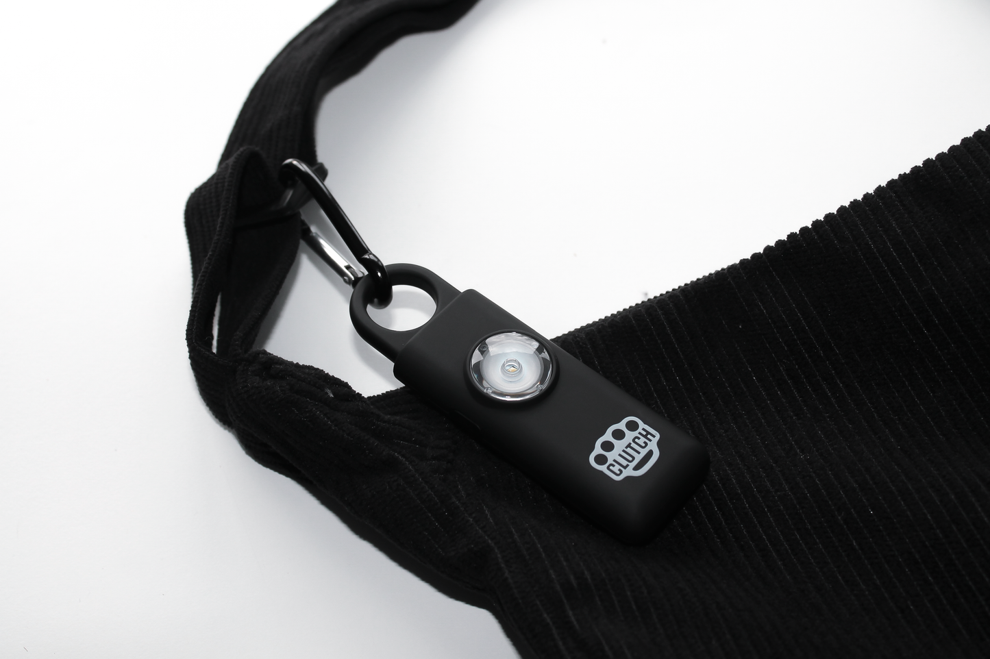 THE SNITCH CLUTCH DEFENSE© KEYCHAIN PERSONAL SAFETY ALARM. AUTOMATIC 911 CALL & EMERGENCY CONTACT GPS LOCATION.